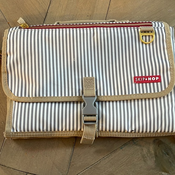 Skip Hop Other - Skip HOP Baby changing pad with  diaper and wipes holder. Has clip to attach to